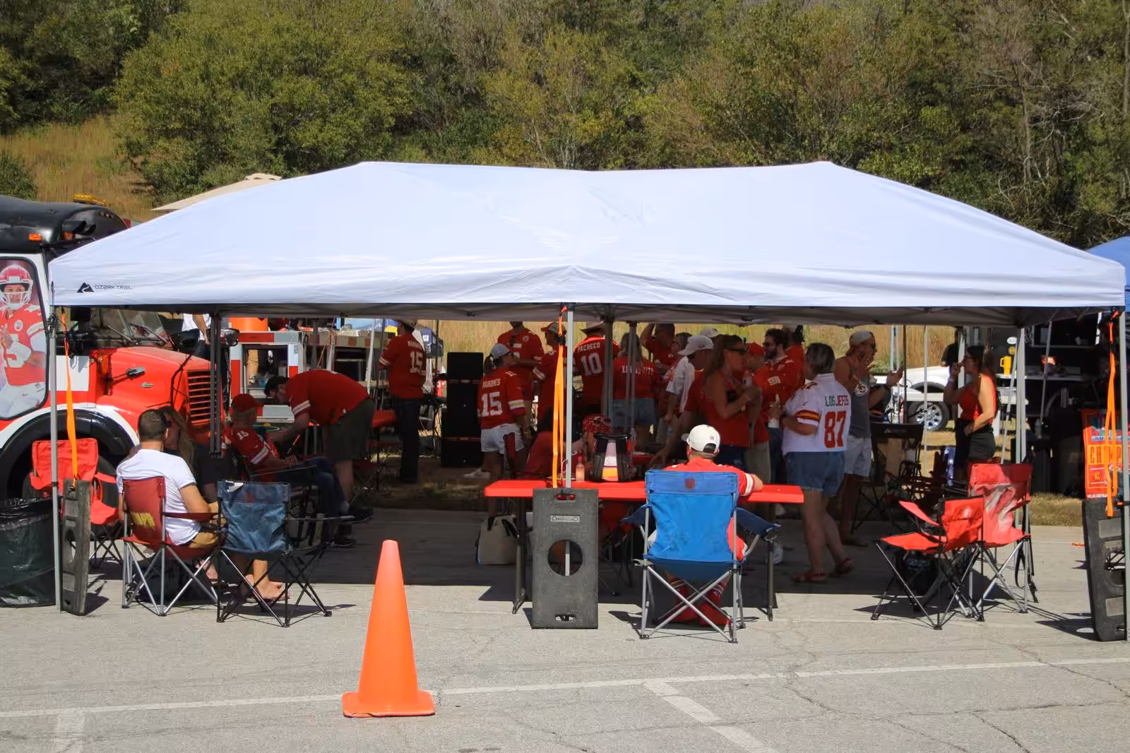 Covered white tailgate tent set up by Red Machine Covered white tailgate tent set up by Red Machine